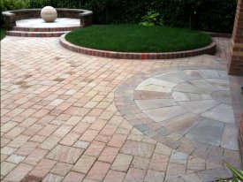 AFTER THIS PREVIOUSLY PLAIN FLAT SPACE IS BROUGHT TO LIFE WITH THE USE OF FLOWING CIRCLES AND VARIOUS LEVELS WARRINGTON