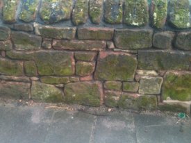 BEFORE SANDSTONE WALL REPOINTING