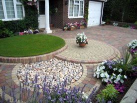 AFTER FRONT GARDEN INCORPORATING CIRCULAR FEATURE ADDS ADDITIONAL INTEREST TO THE DESIGN CHESTER