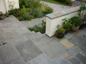 AFTER ALTERATING THE STEPS TO THE PATIO USING GLOBAL STONE OLD RECTORY THE AVAILABLE SPACE HAS BEEN MAXIMISED CRESSINGTON PARK