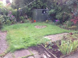 buff-patio-in-indian-sandstone-with-marshalls-tegula-traditional-walling-and-edging-artificial-grass-lawn-2